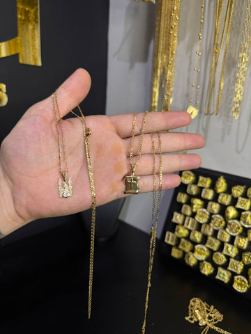 KIT 2 cordões com pingente banhado a ouro 18k 1,5mm 70cm